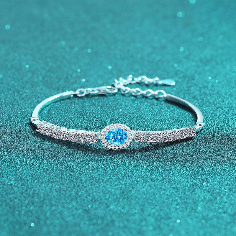 Sterling Silver Oval Blue Moissanite Bracelet with Shell and Star Accents