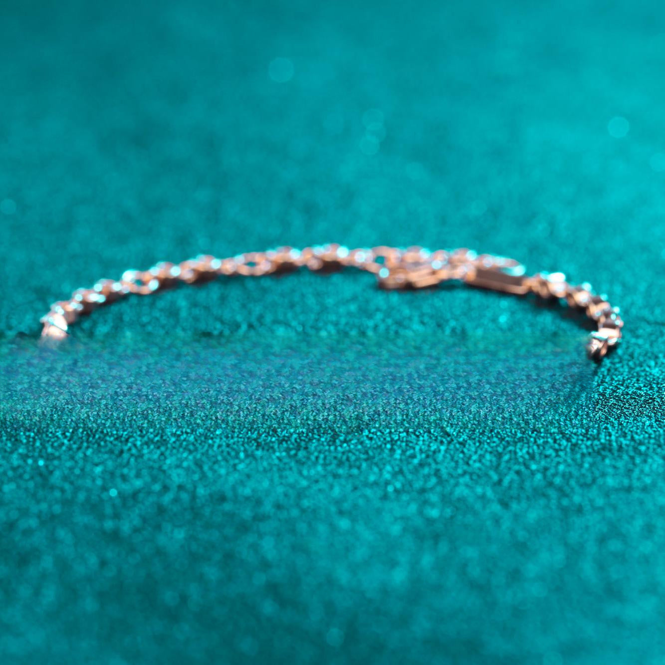 Women's Sterling Silver Moissanite Bracelet with Champagne Gold Finish and Lucky Charm Designs