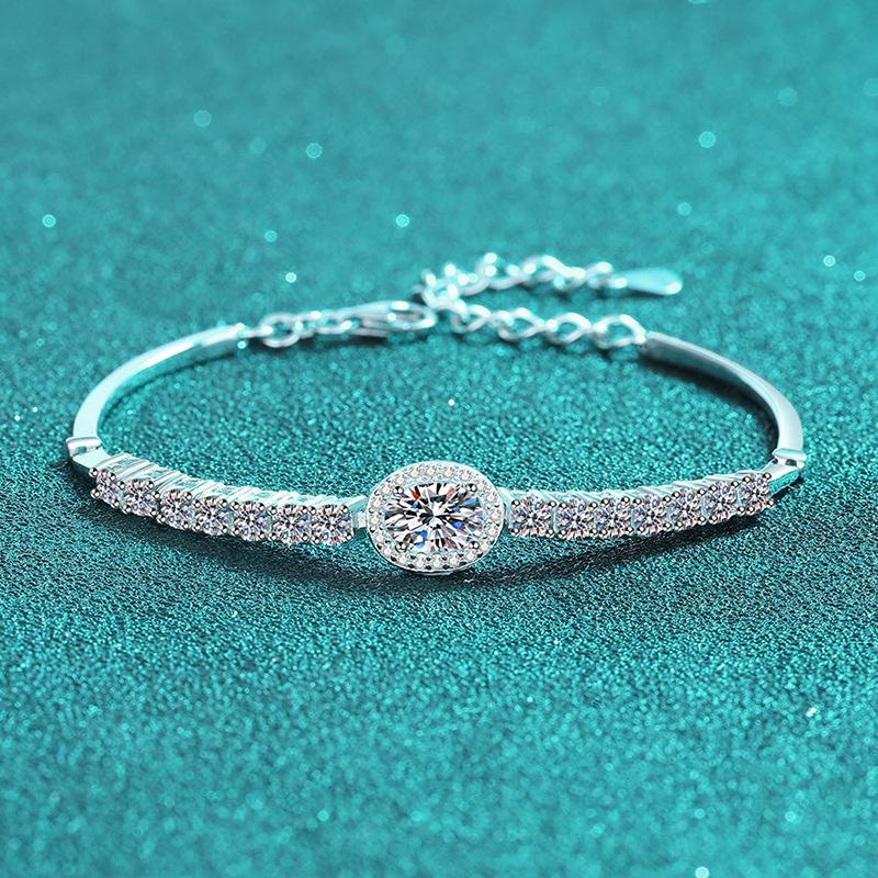 Sterling Silver Oval Blue Moissanite Bracelet with Shell and Star Accents