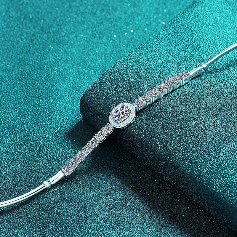 Sterling Silver Oval Blue Moissanite Bracelet with Shell and Star Accents
