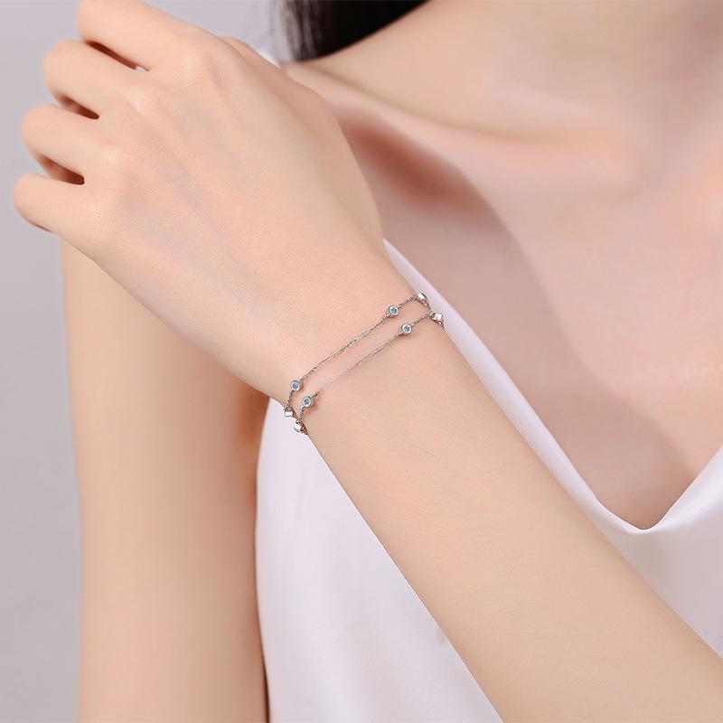 Sterling Silver Dual Chain Bracelet with Square-Cut Moissanite and Blue Gemstones in Leaf and Star Motifs