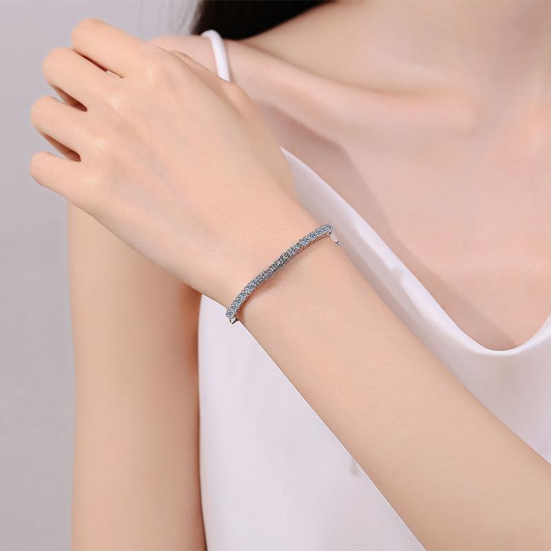Sterling Silver Oval Blue Moissanite Bracelet with Shell and Star Accents